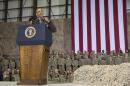 FILE - This May 25, 2014 file photo shows President Barack Obama speaking during a troop rally after arriving at Bagram Air Field for an unannounced visit, north of Kabul, Afghanistan. Senior U.S. administration officials say President Barack Obama will seek to keep 9,800 U.S. troops in Afghanistan after the war formally ends later this year. Nearly all of those forces are to be out by the end of 2016, as Obama finishes his second term. (AP Photo/ Evan Vucci, File)