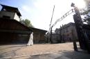 Pope Francis walks through Auschwitz's notorious gate during his visit to the former Nazi death camp