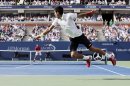 Novak Djokovic, of Serbia, goes airborne to return a shot to Stanislas Wawrinka, of Switzerland, during the semifinals of the 2013 U.S. Open tennis tournament, Saturday, Sept. 7, 2013, in New York. (AP Photo/Charles Krupa)