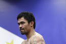 Boxer Manny Pacquiao, of the Philippines, pauses for photos during his workout at Wild Card Boxing Club, Monday, April 27, 2015, in Los Angeles. Pacquiao is scheduled to fight Floyd Mayweather Jr. in a welterweight boxing match in Las Vegas on Saturday. (AP Photo/Jae C. Hong)