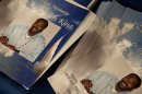 Stacks of programs for Rodney King's public memorial service lie in the Hall of Liberty at Forest Lawn-Hollywood Hills in Los Angeles on Saturday, June 30, 2012. King passed away earlier this month at 47. (AP Photo/Grant Hindsley)