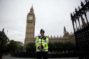 A British police officer stands guard outside the Houses &hellip;