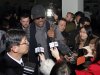 Flamboyant former NBA star Dennis Rodman is surrounded by journalists upon arrival at Pyongyang Airport, North Korea, Tuesday, Feb. 26, 2013. The American known as "The Worm" arrived in Pyongyang, becoming an unlikely ambassador for sports diplomacy at a time of heightened tensions between the U.S. and North Korea. (AP Photo/Kim Kwang Hyon)