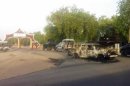 Military vehicles approach the entrance of the Shehu's Palace of Bama