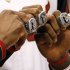 From left, Miami Heat's Dwyane Wade, Chris Bosh and LeBron James pose with their 2012 NBA Finals championship rings during a ceremony before a basketball game against the Boston Celtics, Tuesday, Oct. 30, 2012, in Miami. (AP Photo/The Miami Herald, Charles Trainor Jr.)  MAGS OUT