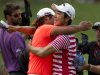 ADDS NAME OF GOLFER ON LEFT SEUNG-YUI NOH - Sang-Moon Bae of South Korea is congratulated by Seung-Yui Noh, also of South Korea, on the 18th green after Bae won the Byron Nelson golf tournament Sunday, May 19, 2013, in Irving, Texas. (AP Photo/Tony Gutierrez)