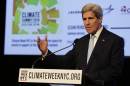 U.S. Secretary of State John Kerry delivers remarks at a NYC Climate Week opening event, at the Morgan Library in New York, Monday, Sept. 22, 2014. (AP Photo/Richard Drew)
