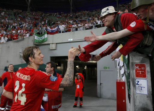 Fans congratulate Russia's Pavlyuchenko after the Euro 2012 soccer match against Czech Republic in Wroclaw