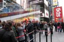 A line of ticket-buyers wait at the TKTS booth, which sells discount tickets to Broadway shows, in New York's Times Square on Wednesday, Oct. 31, 2012. Most Broadway theaters were reopening Wednesday for regular matinee and evening performances following several days of closures related to superstorm Sandy. (AP Photo/Beth J. Harpaz)