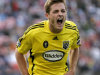 FILE - In this Saturday, Aug. 8, 2009 file photo, Columbus Crew's Robbie Rogers celebrates after scoring against the San Jose Earthquakes during the second half of an MLS soccer match in San Francisco. Rogers is joining the Los Angeles Galaxy of Major League Soccer in another step by gay athletes. Rogers tells The Associated Press his fears about returning to soccer were eased by the support he received from family, fans and players, including Galaxy star Landon Donovan. (AP Photo/Marcio Jose Sanchez, File)