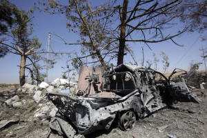 The wreckage of a car belonging to Islamic State militants …