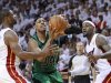 Boston Celtics' Pierce is defended by Miami Heat's Wade and James in Eastern Conference Finals NBA basketball playoff series in Miami