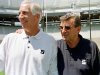 FILE - In this Aug. 6, 1999, file photo, Penn State football coach Joe Paterno, right, poses with his defensive coordinator. Jerry Sandusky, during the college football team's media day in State College, Pa. Former FBI director Louis Freeh, who led a Penn State-funded investigation into the university's handling of molestation allegations against former assistant football coach Jerry Sandusky, is scheduled to release his highly anticipated report Thursday, July 12, 2012. (AP Photo/Paul Vathis, File)