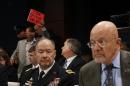 U.S. Director of National Intelligence James Clapper and General Keith Alexander, director of National Security Agency, testify at House Intelligence Committee hearing as a protester against spying is removed from the hearing on Capitol Hill in Washington