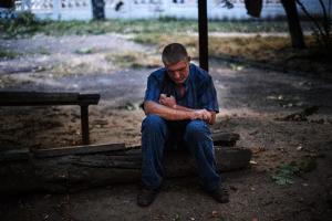 A man reacts after shelling in the town of Yasynuvata&nbsp;&hellip;