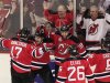 New Jersey Devils' Zach Parise, second from left, celebrates with teammates after scoring a goal in the first period during Game 5 of the NHL hockey Stanley Cup finals against the Los Angeles Kings Saturday, June 9, 2012, in Newark, N.J.. (AP Photo/Frank Franklin II)