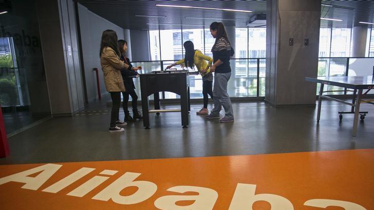 People play in a hall inside Alibaba's headquarters in Hangzhou