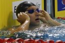 Australia's Thorpe looks at his time after swimming during men's 100m freestyle heats at 2012 Australian Swimming Championships in Adelaide
