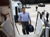 Republican presidential nominee Mitt Romney leaves his campaign bus to board his charter plane in West Palm Beach, Florida