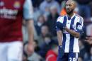 West Bromwich Albion's striker Nicolas Anelka celebrates scoring during an English Premier League football match against West Ham United at The Boleyn Ground, Upton Park in east London on December 28, 2013