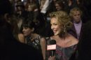 Actress Katherine Heigl is interviewed in the front row at the J. Mendel Autumn/Winter 2013 collection during New York Fashion Week