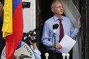 Wikileaks founder Julian Assange arrives to speak from the balcony of Ecuador's embassy in London