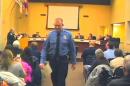 FILE - In this Feb. 11, 2014 file image from video provided by the City of Ferguson, Mo., officer Darren Wilson attends a city council meeting in Ferguson. Wilson is not expecting to face criminal charges from a Missouri grand jury that has been investigating the nationally watched case for the past several months, a police union official said Thursday, Nov. 20, 2014. Jeff Roorda, the business manager for the St. Louis Police Officers' Association, said he met Thursday with Ferguson Police Officer Wilson, who has remained secluded from the public eye since the Aug. 9 shooting. Wilson remains confident in the outcome of the grand jury investigation, Roorda said. (AP Photo/City of Ferguson, File)