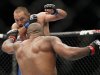 Dan Henderson defends against Rashad Evans during UFC 161 in Winnipeg, Manitoba on Saturday June 15, 2013.  (AP Photo/The Canadian Press, John Woods)