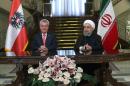 Iranian President Hassan Rouhani (right) holds talks with his Austrian counterpart Heinz Fischer during a press conference in Tehran, on September 8, 2015