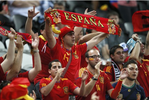 Spain's fans cheer before their Euro 2012 semi-final soccer match against Portugal in Donetsk