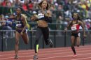 Sanya Richards-Ross finishes in the women's 200 meters qualifying at the U.S. Olympic athletics trials in Eugene, Oregon