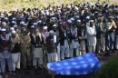 Tribesmen attend a funeral of a paramilitary soldier who was kidnapped and executed by Taliban militants at Darra Adam Khel
