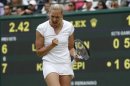 Kaia Kanepi of Estonia celebrates after defeating Laura Robson of Britain in their women's singles tennis match at the Wimbledon Tennis Championships, in London July 1, 2013. REUTERS/Eddie Keogh