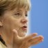 German Chancellor Angela Merkel gestures during a press conference in Berlin, Germany, Monday, Sept. 17, 2012. (AP Photo/Markus Schreiber)