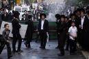 Ultra-Orthodox Jews take part in a demonstration against compulsory military service on April 10, 2014 in Jerusalem