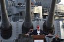 Republican presidential frontrunner Donald Trump, seen speaking aboard a World War II battleship on September 15, 2015, targeted opponent Hillary Clinton and her ex-president husband December 28 with new jabs about Bill Clinton's "terrible record"