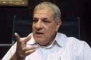 File photo of Egypt's Housing Minister Mahlab talking during an interview with the media in Cairo