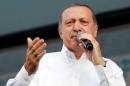 Turkey's Prime Minister and presidential candidate Tayyip Erdogan speaks during an election rally in Diyarbakir