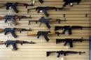 A selection of AK and AR rifles are seen for sale at the Pony Express Firearms shop in Parker