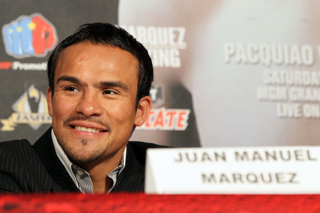 BEVERLY HILLS, CA - SEPTEMBER 17: Boxer Juan Manuel Marquez smiles during the Manny Pacquiao v Juan Manuel Marquez - Press Conference at Beverly Hills Hotel on September 17, 2012 in Beverly Hills, California. (Photo by Victor Decolongon/Getty Images)