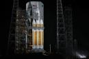 The service structure is rolled away from NASA's Orion spaceship early Thursday, Dec. 4, 2014, in Cape Canaveral, Fla. Orion is scheduled to lift off later this morning on a United Launch Alliance Delta 4-Heavy rocket on its first unmanned orbital test flight. (AP Photo/Chris O'Meara)