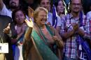 Chilean president-elect, Michelle Bachelet, celebrates after getting the results of the run-off presidential election in Santiago on December 15, 2013