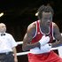 Cameroon's Essomba reacts after he defeated Morocco's Daraa in the Men's Light Fly (49kg) Round of 32 boxing match during the London 2012 Olympic Games
