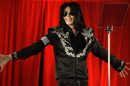 FILE - This March 5, 2009 file photo shows singer Michael Jackson announcing his concerts at the London O2 Arena. Jackson's words and music rang through a courtroom once again on Monday, April 29, 2013, this time at the start of wrongful death trial, as a lawyer tried to show jurors the pop singer's loving relationship with his mother and children. (AP Photo/Joel Ryan, file)