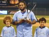 American League All-Star Prince Fielder of the Detroit Tigers and his sons Jaden and Haven pose with the trophy after Fielder won the Major League Baseball All-Star Game Home Run Derby in Kansas City