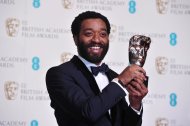 British actor Chiwetel Ejiofor poses with the award for a leading actor for his work on the film "12 Years a Slave" at the BAFTA British Academy Film Awards at the Royal Opera House in London on February 16, 2014