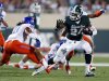 Michigan State's Le'Veon Bell, right, rushes against Boise State's Jeremy Ioane (10) during the first quarter of an NCAA college football game, Friday, Aug. 31, 2012, in East Lansing, Mich. (AP Photo/Al Goldis)