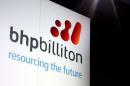 A promotional sign adorns a stage at a BHP Billiton function in central Sydney