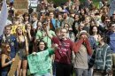 Students and others yell at a pro-marijuana rally at the University of Colorado in Boulder