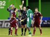 An official shows a yellow card to Nigeria's Nosa during their international friendly soccer match against Venezuela in Miami